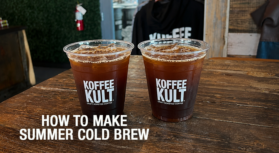 Two clear plastic cups filled with iced coffee on a rustic wooden table, both printed with the Koffee Kult logo. Large white text at the bottom reads 'HOW TO MAKE SUMMER COLD BREW'.