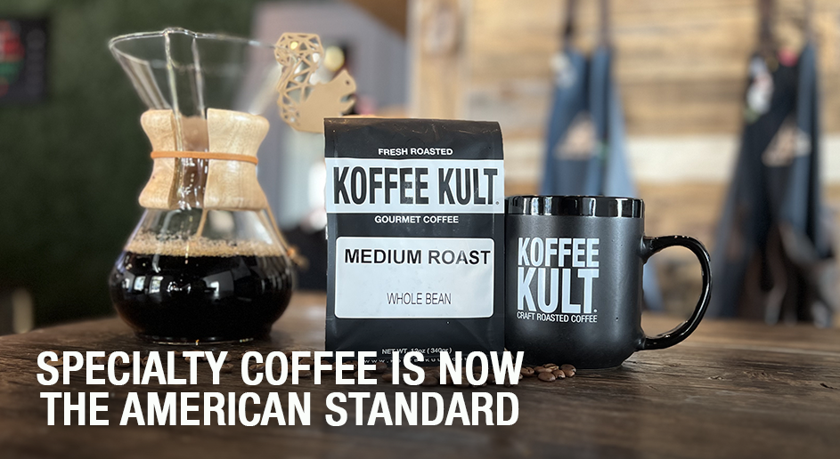 Koffee Kult coffee packaging with a mug and coffee maker on a wooden surface.