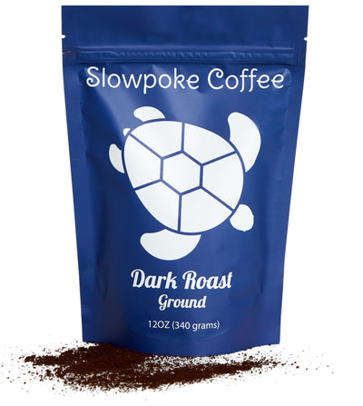 slow poke dark roast coffee front ground with beans