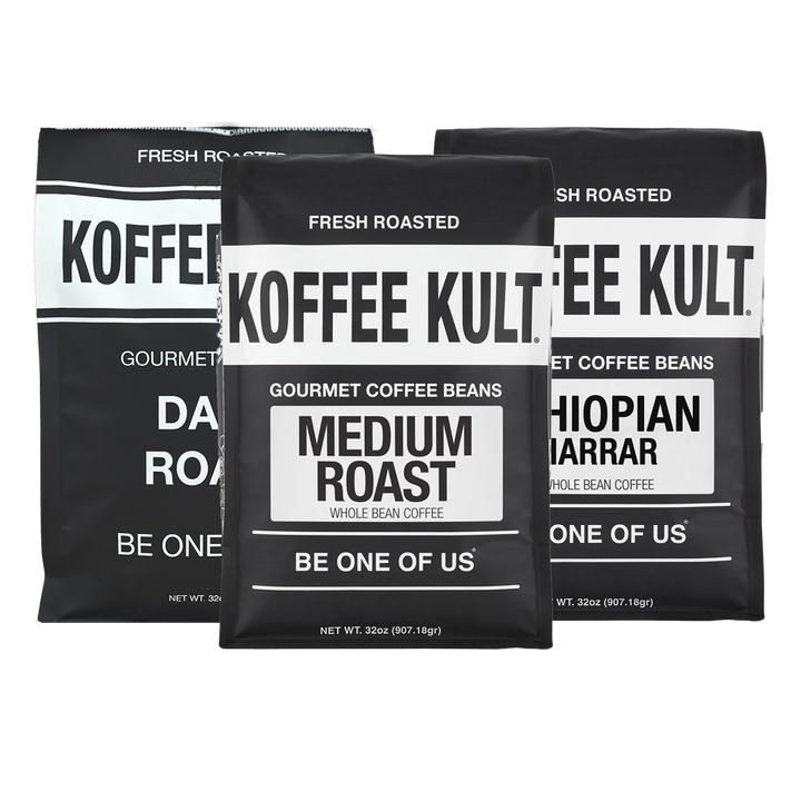 Three black coffee bean bags from Koffee Kult. Gourmet Coffee Beans arranged together on a plain white background, with labels for Dark Roast, Medium Roast, and Ethiopian Mararar.