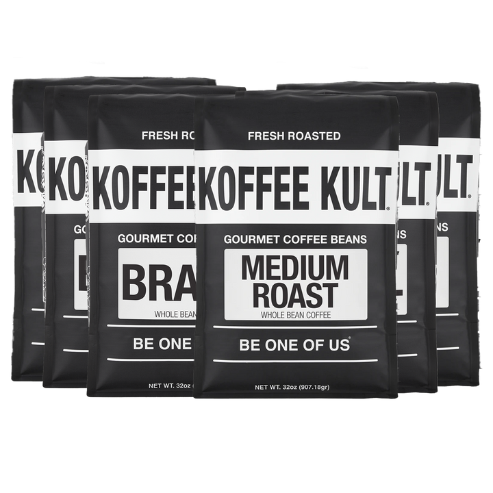 Five black bags of Koffee Kult Gourmet Coffee Beans, Medium Roast, arranged in a row against a white background.