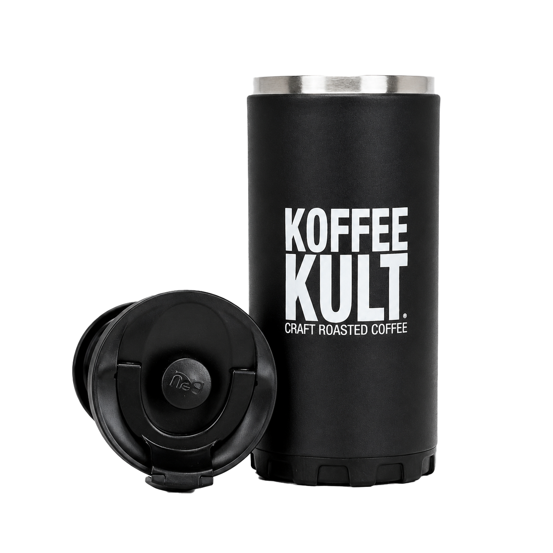 A black insulated coffee cup with a stainless steel rim, featuring the white text 'KOFFEE KULT' and 'CRAFT ROASTED COFFEE' on the side. A separate black lid is placed in front of the cup on a clean white background.