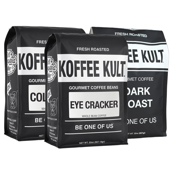 Three black coffee bags from Koffee Kult arranged together on a white background, with the center bag labeled Eye Cracker and the side bags partially visible behind it.