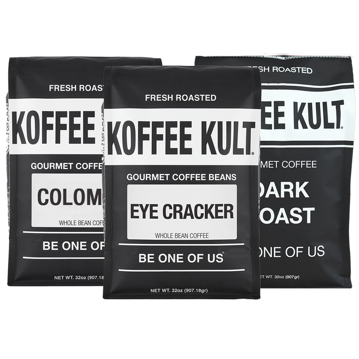 Three black coffee bags from Koffee Kult arranged together on a white background, featuring Colombian, Eye Cracker, and Dark Roast varieties.