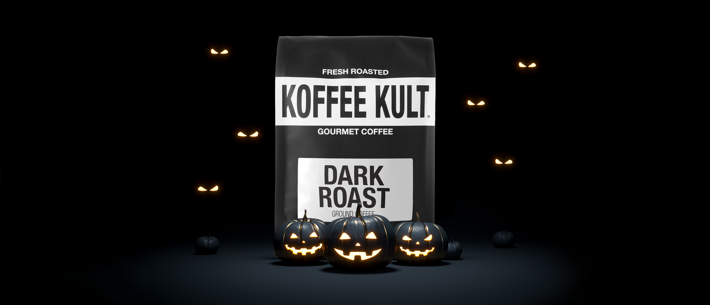 Koffee Kult Dark Roast coffee bag with Halloween-themed pumpkins on a dark background