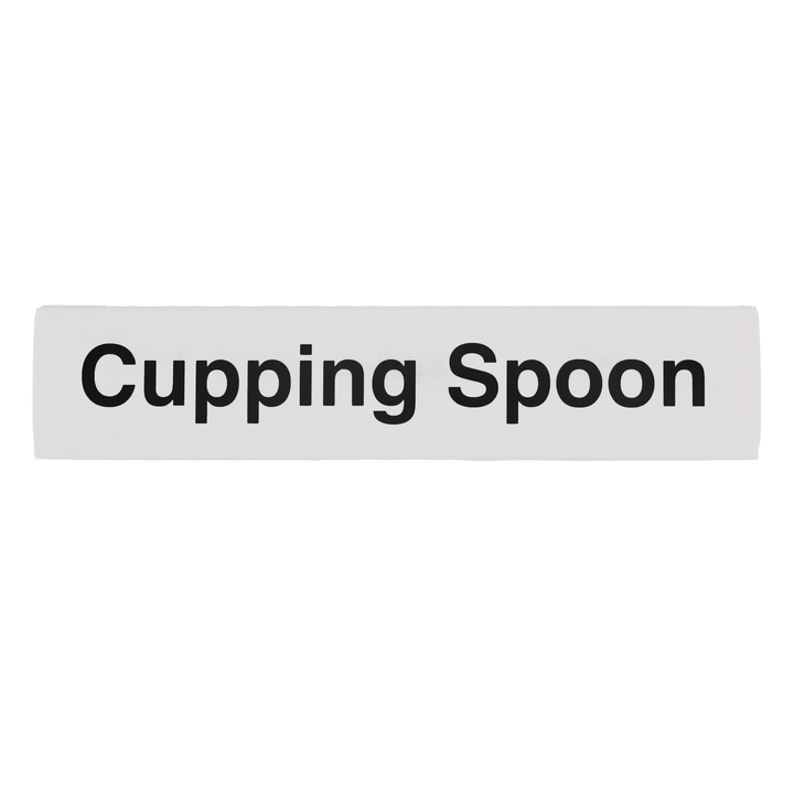 Rectangular white sign with 'Cupping Spoon' text on a white background