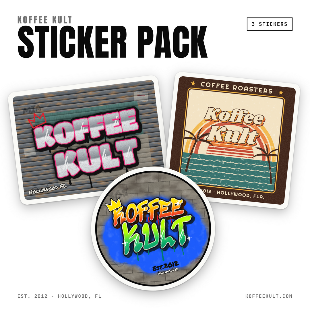 Koffee Kult Sticker Pack featuring three custom stickers: a rectangular sticker with pink graffiti-style 'KOFFEE KULT' text on a gray brick wall, a round sticker with a colorful retro sunset and palm tree design, and a circular sticker with a gray wood-grain background and vibrant yellow, orange, and green graffiti lettering.