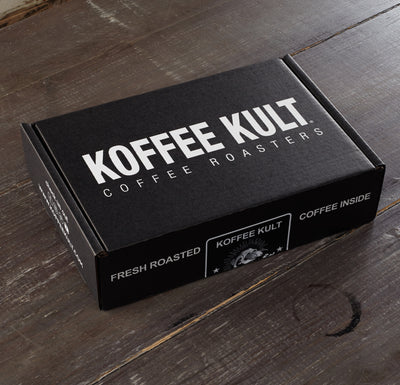 Koffee Kult gift box 32oz and shirt on table